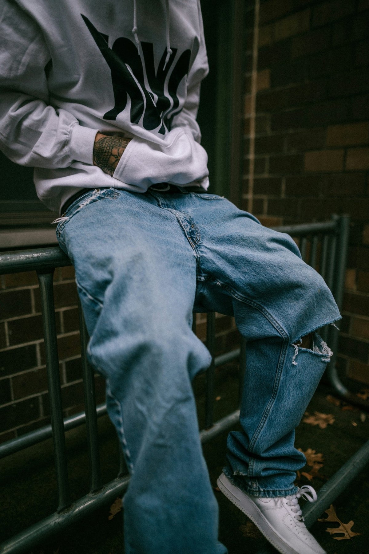 Person wearing baggy streetwear jeans