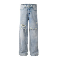 Ripped, light-wash, wide-leg jeans.