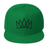 Green snapback hat featuring a crown design, ideal for trendy streetwear styles