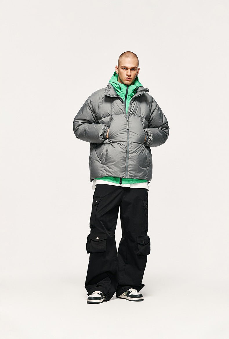 Gray puffer jacket with black cargo pants.
