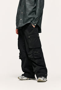 Black cargo pants with multiple pockets.