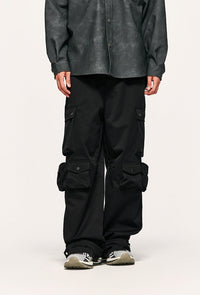 Black cargo pants with large pockets.
