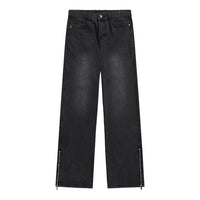 Black wide-leg jeans with ankle zippers.