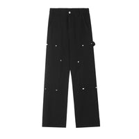 Black carpenter pants with silver rivets.