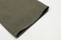 Olive green fabric hem.