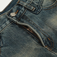 Blue denim jeans with zipper.
