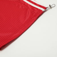 Red Retro Track Pants featuring red drawstring shorts with white stripes