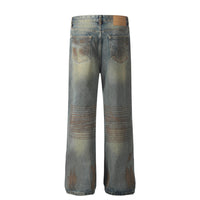 Distressed blue denim jeans.