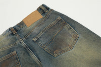 Worn blue denim jeans.