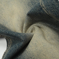 Faded blue denim fabric.