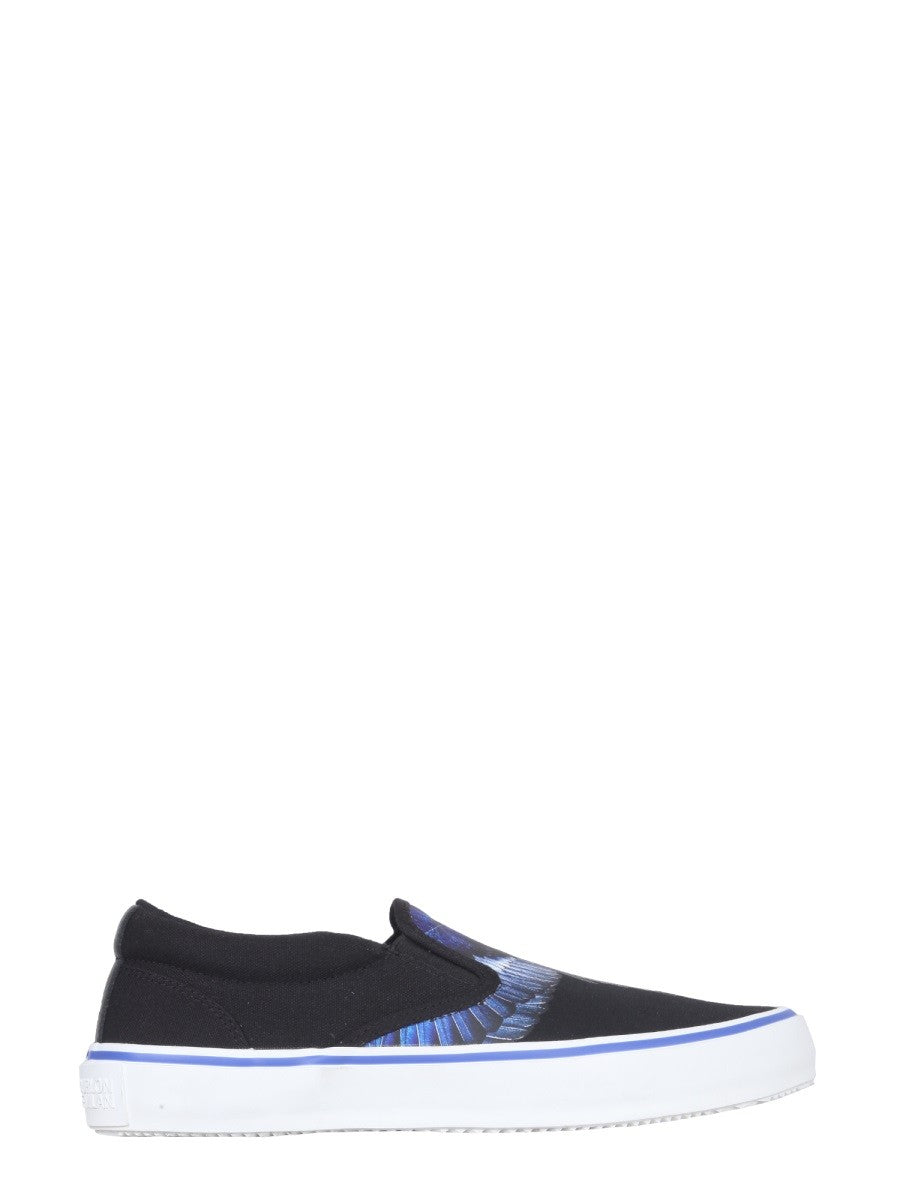 Vulkaniserade slip-ons med fågeltryck