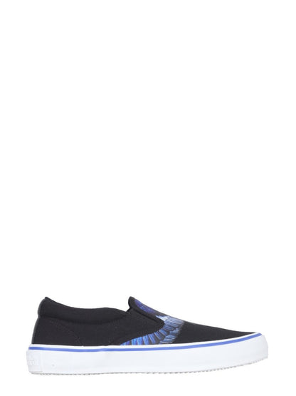 Vulkaniserade slip-ons med fågeltryck