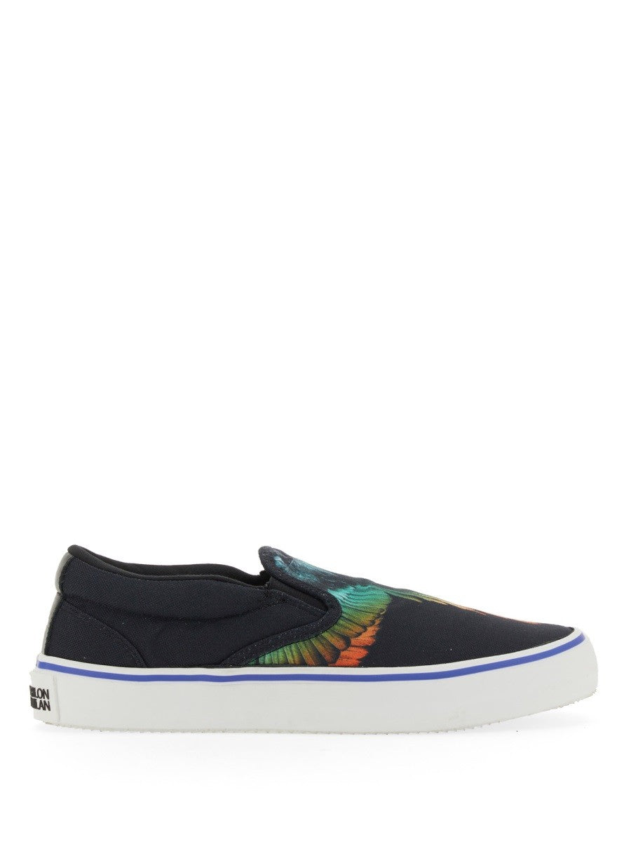 Vulkaniserade slip-ons med fågeltryck