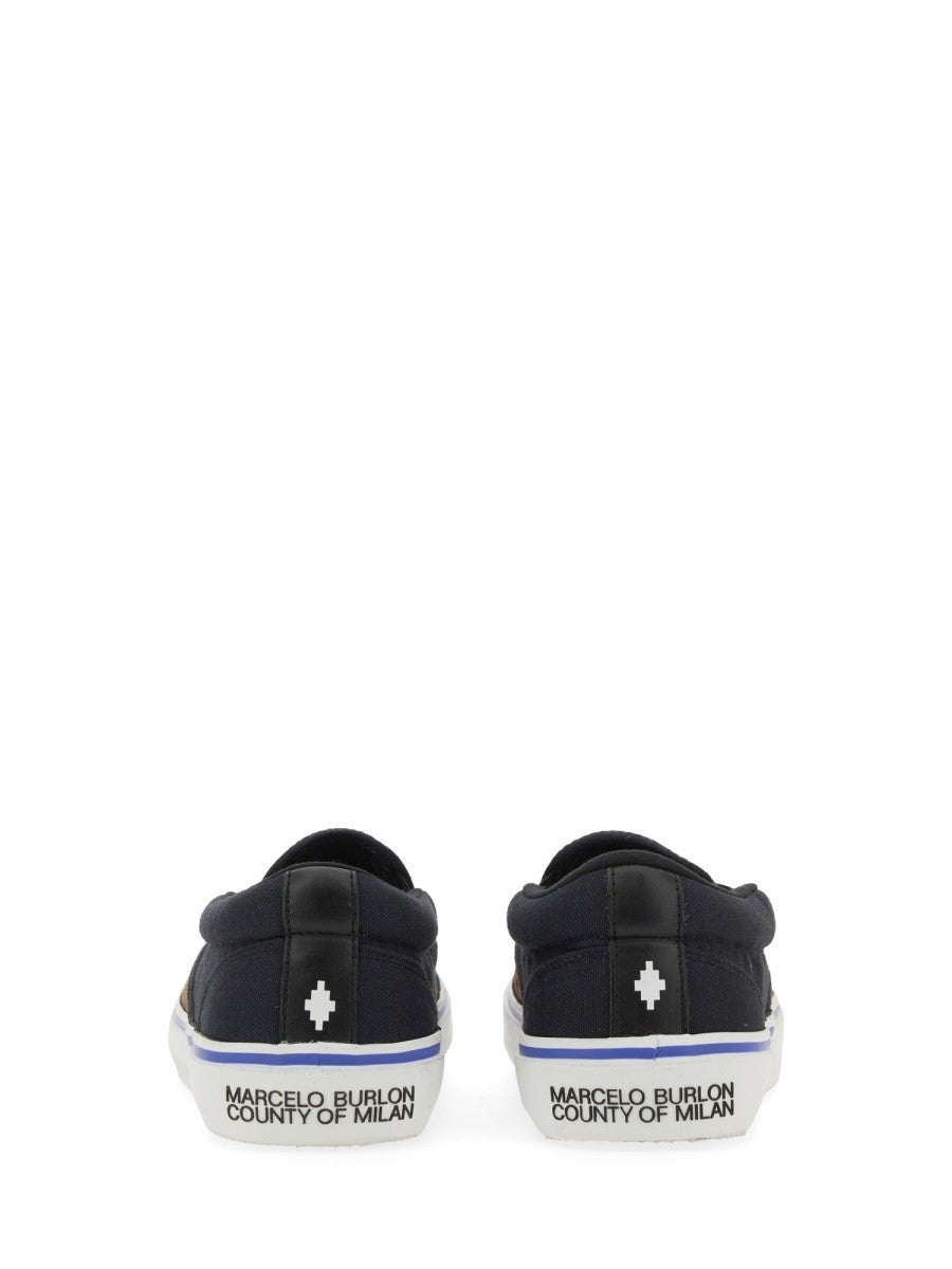 Vulkaniserade slip-ons med fågeltryck