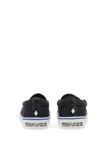 Vulkaniserade slip-ons med fågeltryck