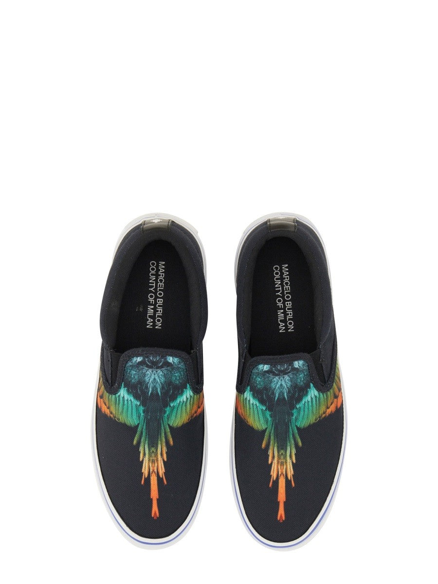 Vulkaniserade slip-ons med fågeltryck