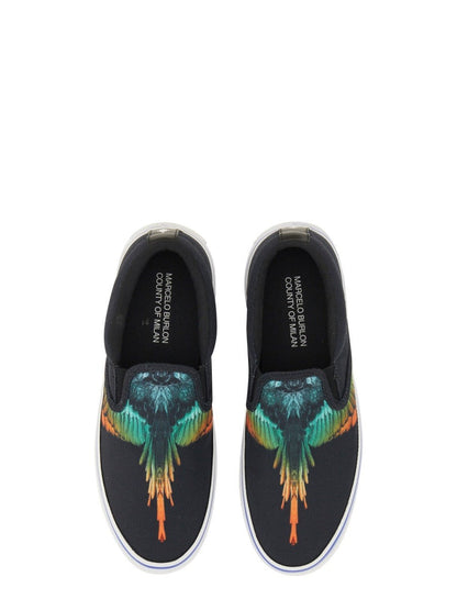 Vulkaniserade slip-ons med fågeltryck