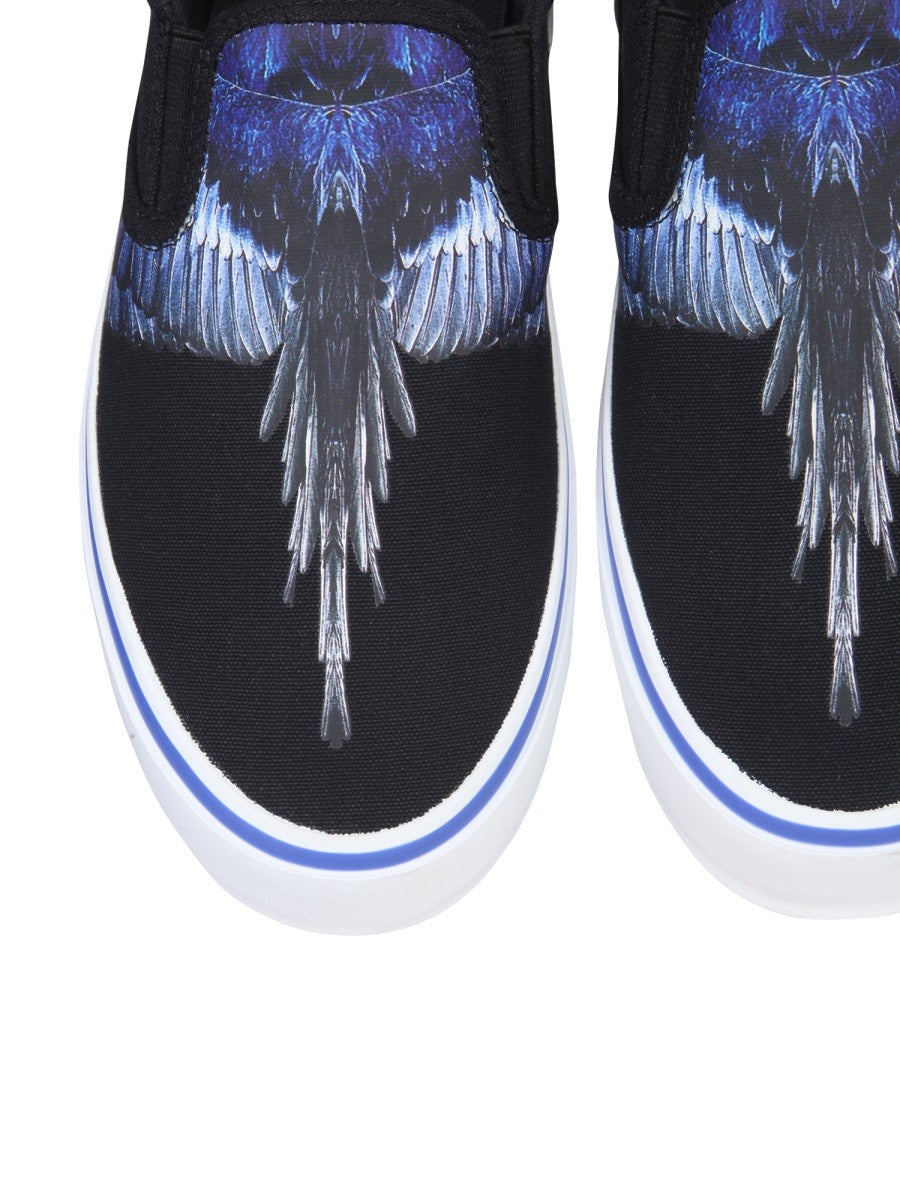 Vulkaniserade slip-ons med fågeltryck