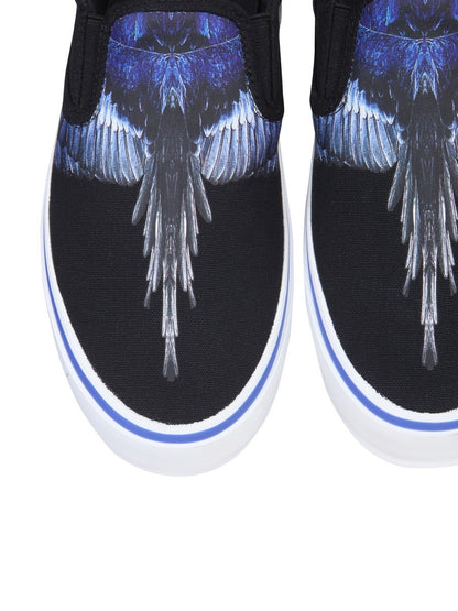 Vulkaniserade slip-ons med fågeltryck