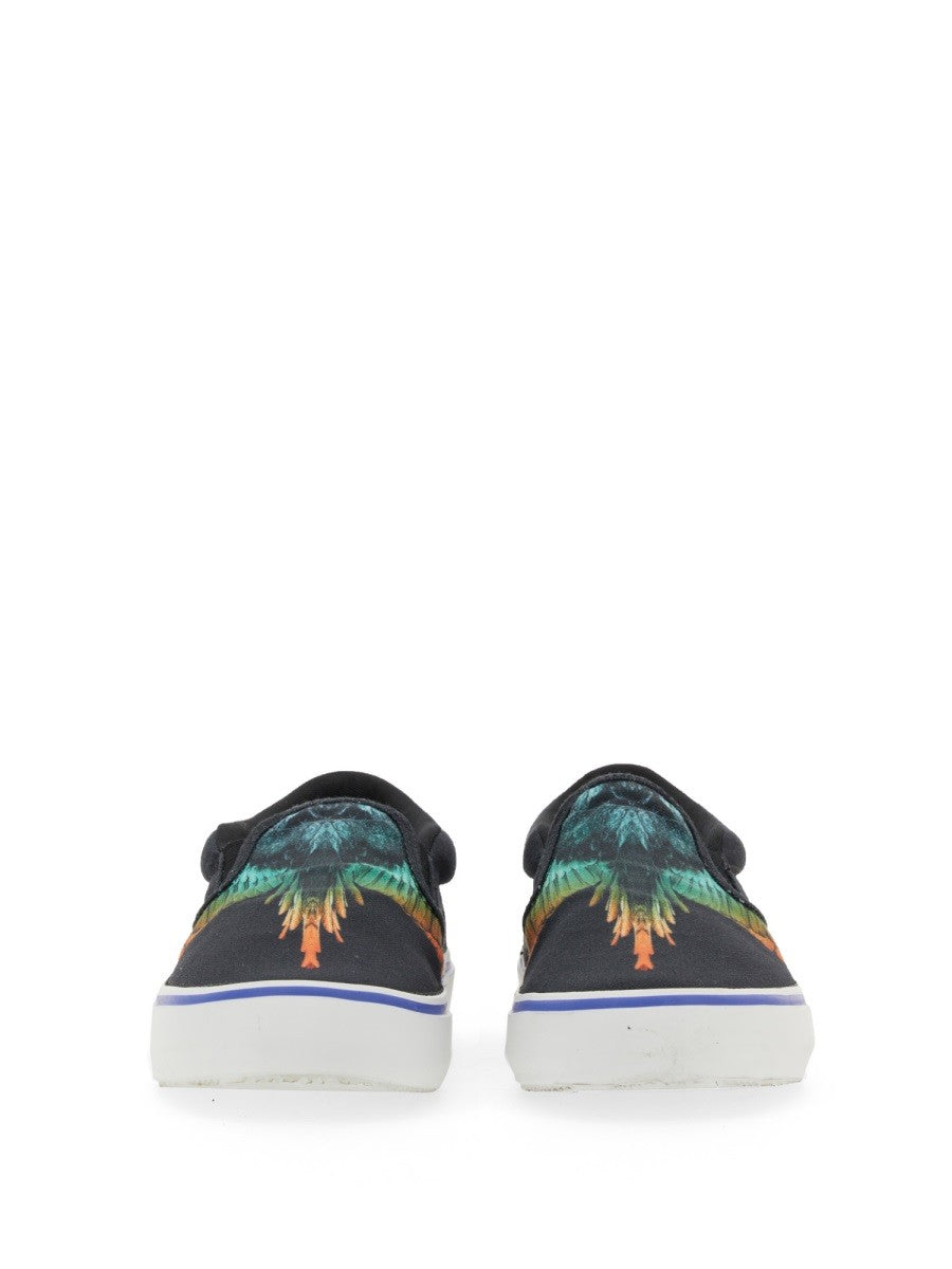Vulkaniserade slip-ons med fågeltryck