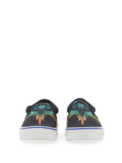 Vulkaniserade slip-ons med fågeltryck