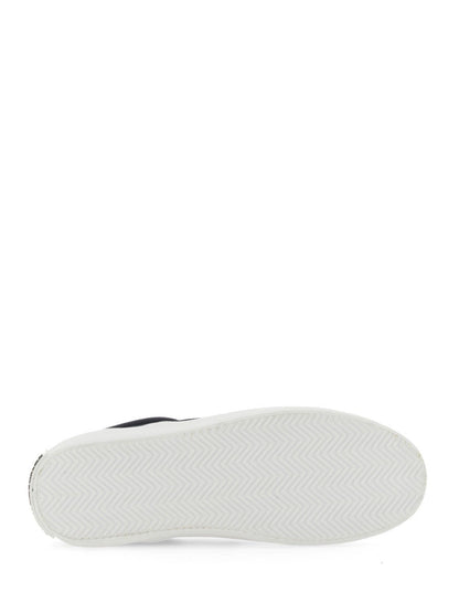 Vulkaniserade slip-ons med fågeltryck