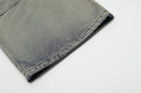 Gray denim fabric of Washed Blue Cargo Jeans showcasing texture and style